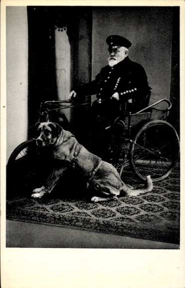 Postcard war veteran in a wheelchair, disability dog