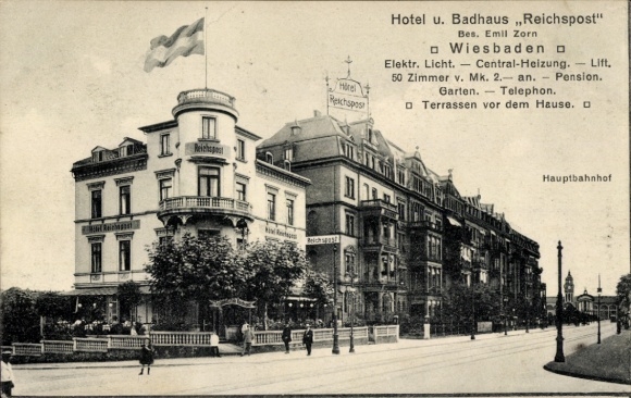 Ak Wiesbaden in Hessen, Hotel Reichspost, Bes. Emil Zorn, Hauptbahnhof, Straßenansicht
