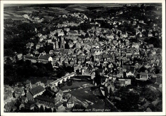 Postcard Wetzlar an der Lahn, Wetzlar from the airplane, black and white, divided by the Lahn, left...