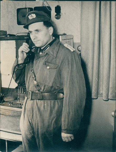 Photo Rostock, factory photo VEB shipyard Neptun, man in uniform, telephone, GDR, People&#39;s Police
