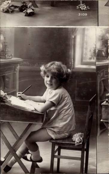 Postcard boy at the desk, misprint