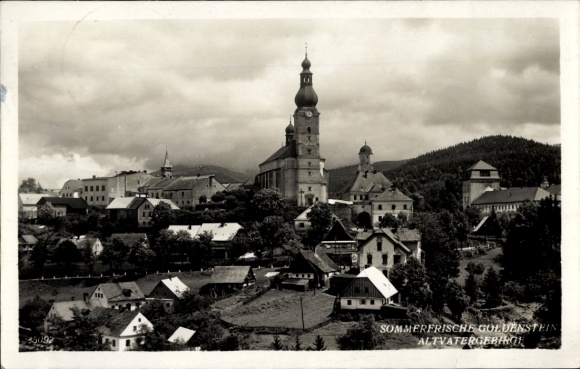 Ak Branná Goldenstein Region Olmütz, Vorschau auf  Kirche, Berglandschaft, alte Häuser