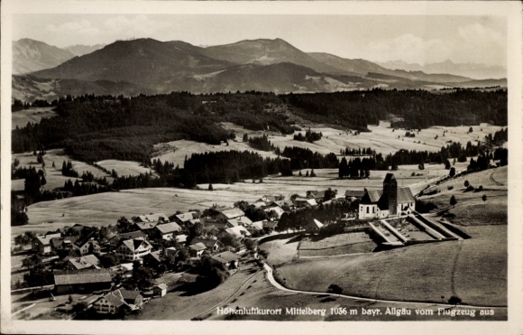 Postcard Mittelberg in Allgäu, aerial view of mountains, houses, church