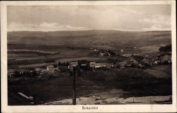 PC Birkenfeld in Rhineland-Palatinate, panorama of the place and surroundings, fields
