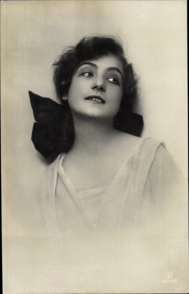 Postcard portrait of a young woman, blouse, hairstyle, bow