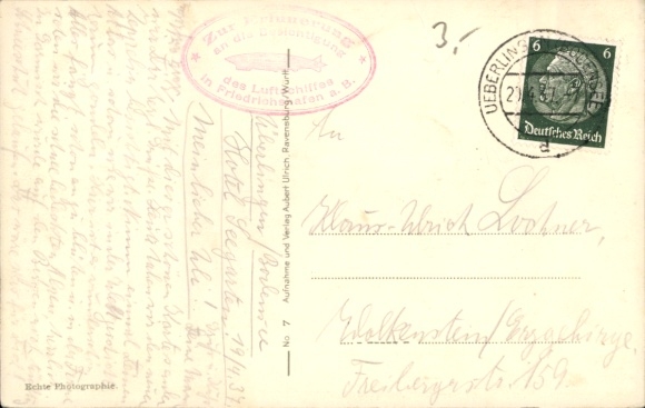 Postcard Friedrichshafen on Lake Constance, airship LZ 127 Graf Zeppelin, bringing into the airship hangar