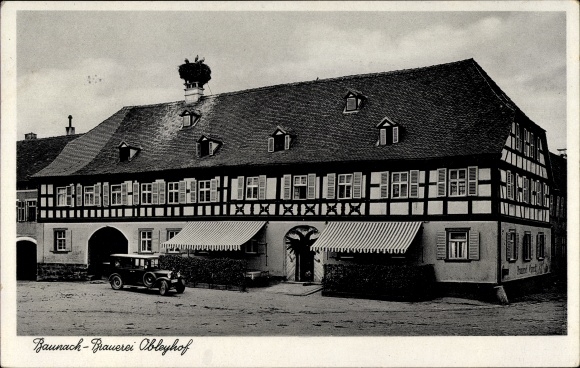 PC Baunach in Upper Franconia, brewery Obleyhof, stork&#39;s nest, car