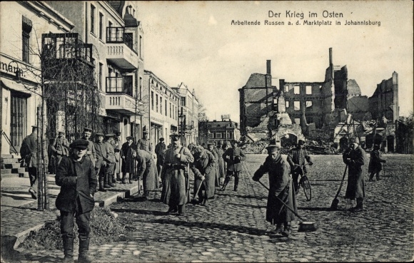 PC Pisz Johannisburg East Prussia, working Russians on the market square, war damage, I WW