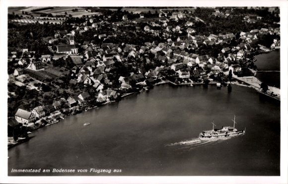 Ak Immenstaad am Bodensee, Luftaufnahme von Immenstaad, Bodensee, Häuser, Boot