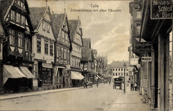 Postcard Celle in Lower Saxony, Zöllnerstraße, old houses, shops, horse-drawn carriages, MAGGI