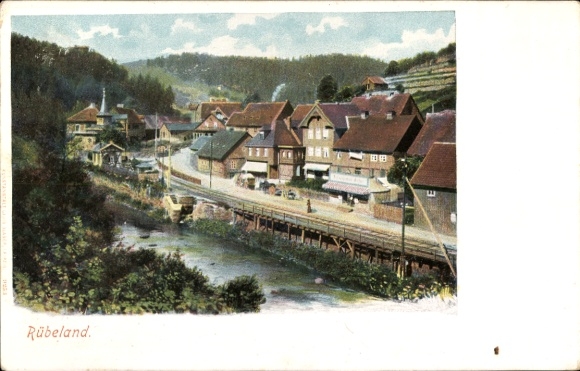 Postcard Rübeland Oberharz am Brocken, landscape with houses, river, bridge, forest, picturesque village