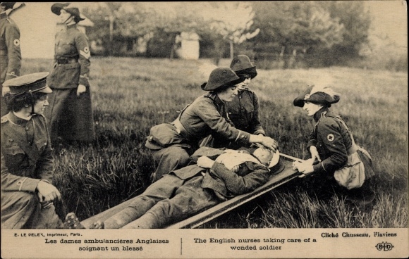 Postcard The English Nurses taking care of a wounded soldier