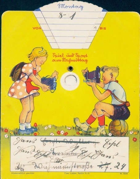 Rotating timetable, two children with cameras