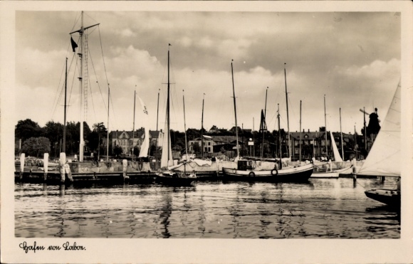 Postcard Ostseebad Laboe, harbor view with sailboats, dark clouds, water surface reflected