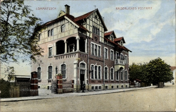 Ak Lommatzsch in Sachsen, Kaiserliches Postamt, s Gebäude, helles Wetter, Straßenansicht