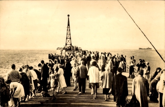 Postcard Ostseebad Warnemünde Rostock, crowd on a pier, view of the sea, landmark
