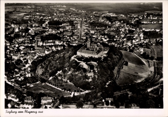 Postcard Siegburg an der Sieg, aerial view of the city, castle visible, trees, fields