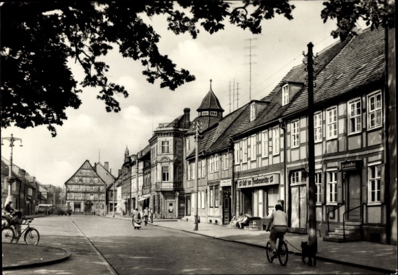 Postcard Kyritz in der Prignitz, unity square, café at the Friedenseiche, bus stop, half-timbered houses
