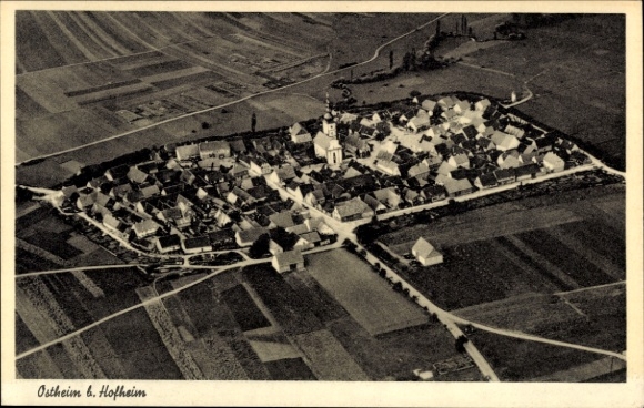 Postcard Ostheim Malsfeld in Hesse, aerial view of Ostheim, church in the center, rural surroundings