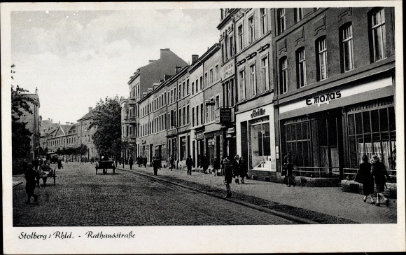Ak Stolberg im Rheinland, Blick in die Rathausstraße, Geschäfte E. Monas, Schüller, Passanten
