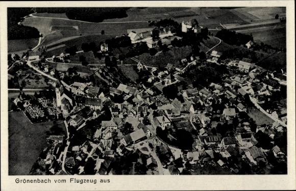Postcard Bad Grönenbach in Allgäu, Grönenbach from the plane, houses, streets, fields, a church...