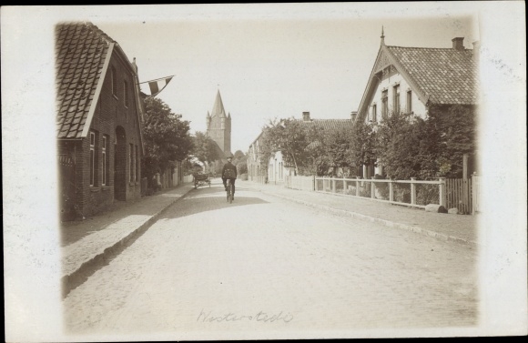 Photo Postcard Westerstede in Oldenburg Ammerland, street section, tower