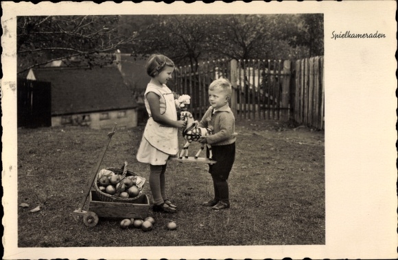 Postcard Boy and girl with wooden horse, cart with apples, playmates