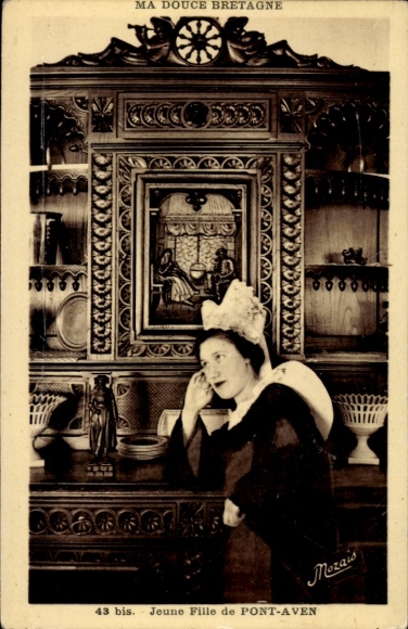 PC Pont Aven Finistère, woman in Breton costume, cupboard