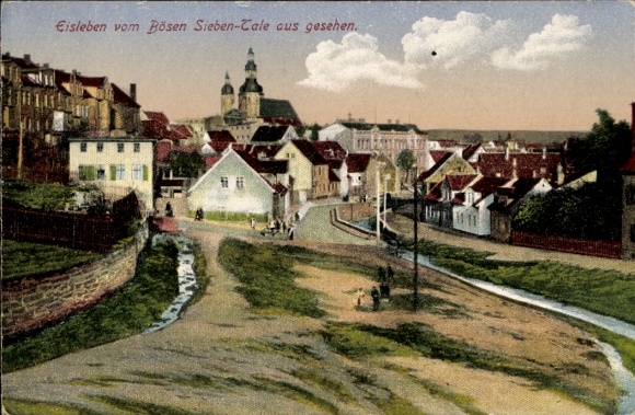 Postcard Lutherstadt Eisleben, street view, church, houses, river, trees