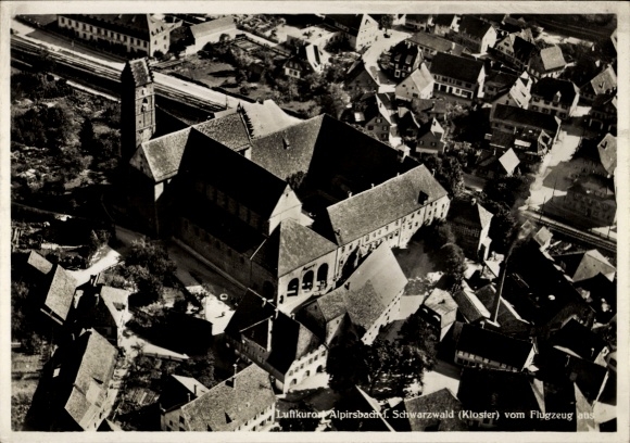 Ak Alpirsbach im Kreis Freudenstadt, Fliegeraufnahme von der Stadt, Kloster