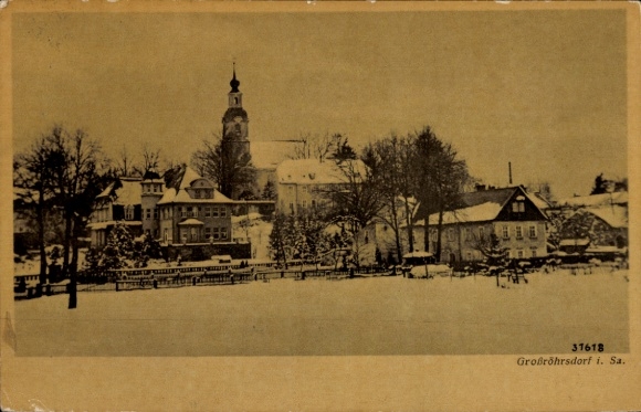 Picture PC Großröhrsdorf in Saxony, snowy landscape, church in the background, historic buildings,...