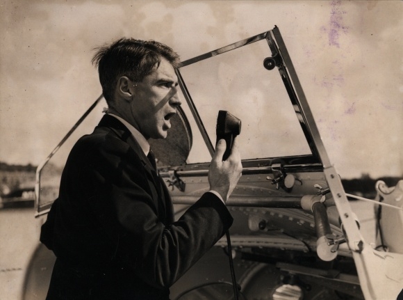 Photo British Lifeboat, Engineer Wallace testing the loud-hailer