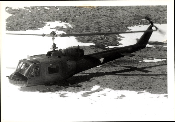 Photo Austrian military helicopter on the ground, Augusta Bell