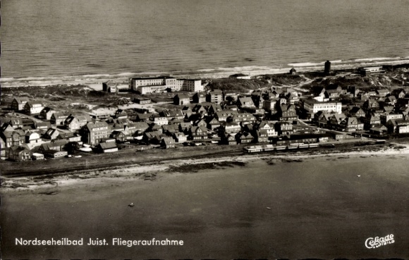 Postcard North Sea resort Juist in East Frisia, aerial view of the North Sea spa houses, beach, dunes