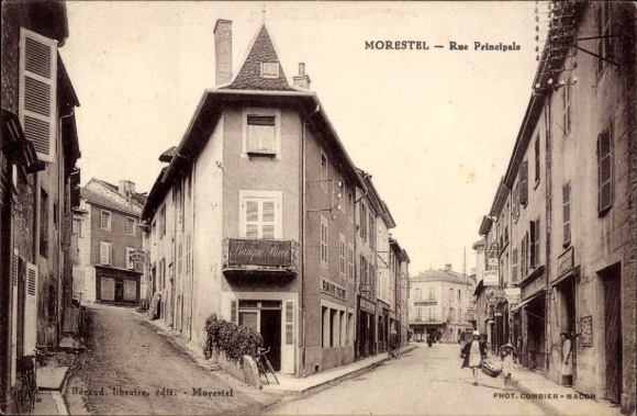 Ak Morestel Isère, Rue Principale, Gebäude, Straßenansicht, historisch, Photographie