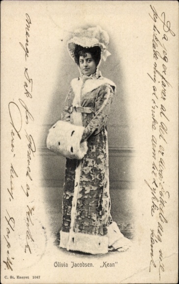 Postcard actress and dancer Olivia Jacobsen, Kean, standing portrait, coat, fur muff
