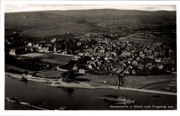 Postcard Geisenheim am Rhein Hesse, aerial view of Geisenheim am Rhein, waterway, buildings