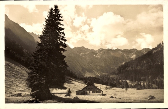 Postcard Bad Hindelang in the Oberallgäu, mountain landscape, large fir tree, house, clouds, Alps