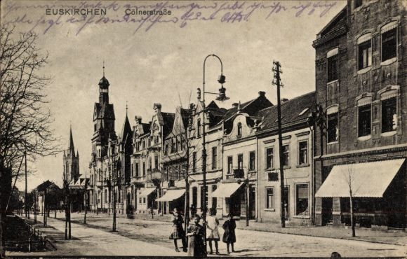 Postcard Euskirchen North Rhine Westphalia, facade of old buildings, street with lanterns, people on the S
