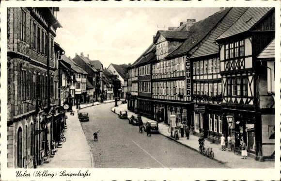 Postcard Uslar in Solling Lower Saxony, Langestraße, half-timbered houses, Schubert shop