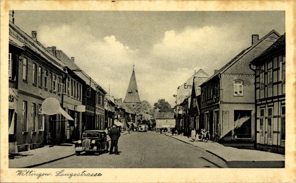 Ak Wittingen in Niedersachsen, Stadtansicht, Langeetrasse, Kirche, alte Gebäude, Auto