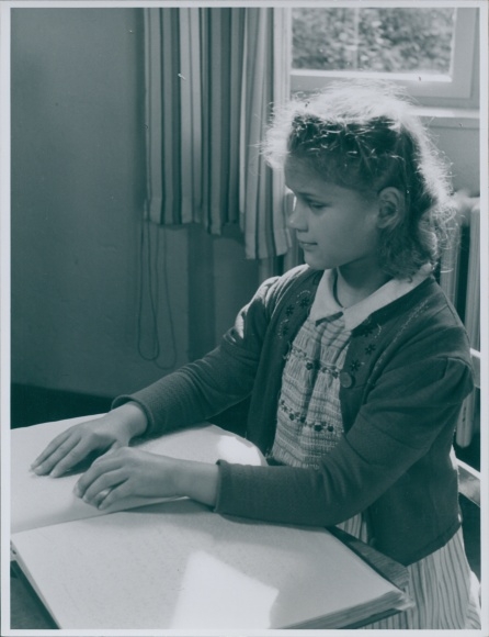 Photo Bert Sass, Berlin, School for the Blind, blind girl reading, around 1950