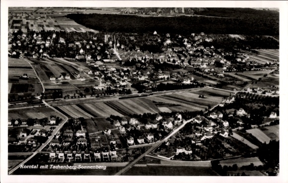 Postcard Korntal Münchingen in Strohgäu Württemberg, village with Tachenberg Sonnenberg, aerial photograph