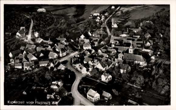 Postcard Kupferzell in Württemberg, aerial view, many houses, street, church
