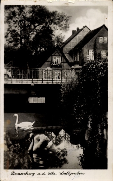 Postcard Boizenburg on the Elbe, swans in the water, houses, bridge, idyllic landscape