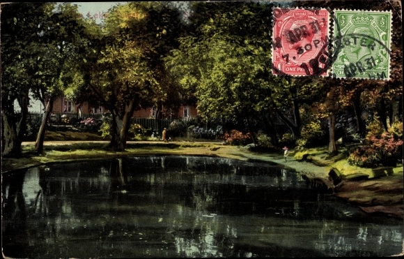 Postcard Great Britain, house behind trees by the water