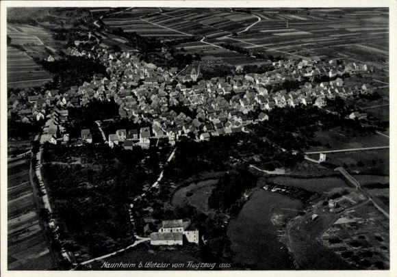 Postcard Naunheim Wetzlar an der Lahn, aerial view of Naunheim, tractor vehicles, residential buildings, fields